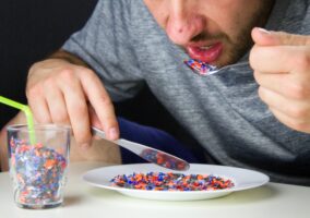 Bigstock the man eats pieces of crushed 248158402