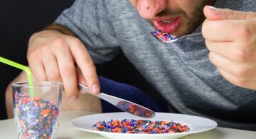 Bigstock the man eats pieces of crushed 248158402