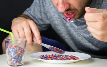 Bigstock the man eats pieces of crushed 248158402